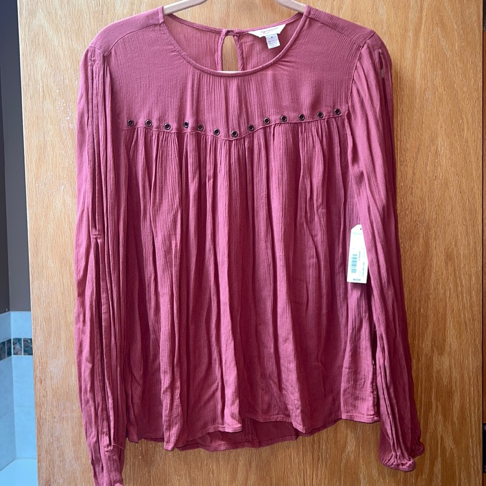 Long sleeved top with slits on arm- burnt orange/rust color